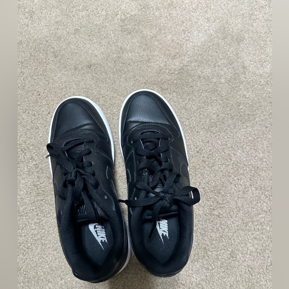 Black Nikes, size 7.5